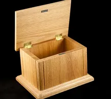 Wooden pet urn with hinged lid open, showing the interior and a simple, classic design